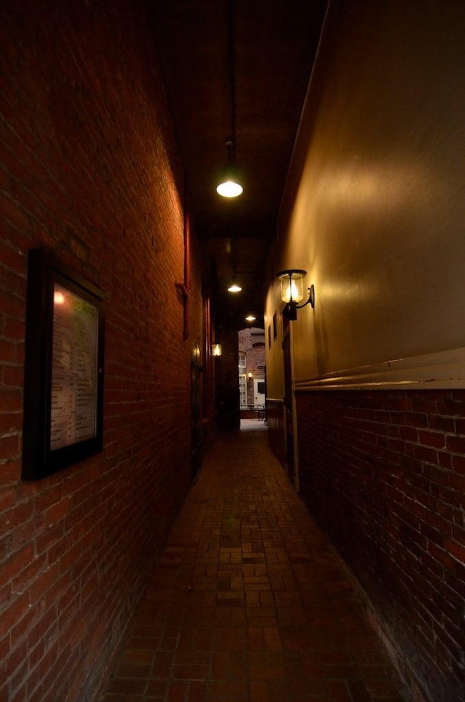 The passageway between Old Town Pizza and Hobo's Restaurant. 