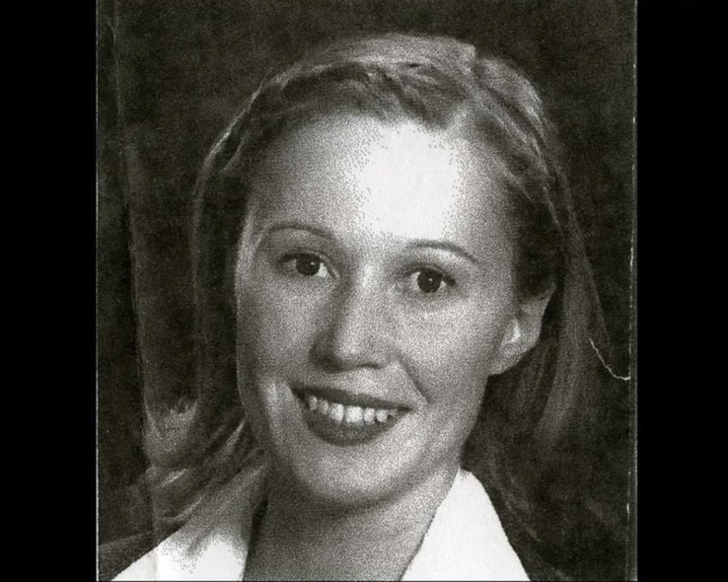 A black-and-white photograph of a young, blonde, white, female-presenting adult: Karin Catherine Waldegrave