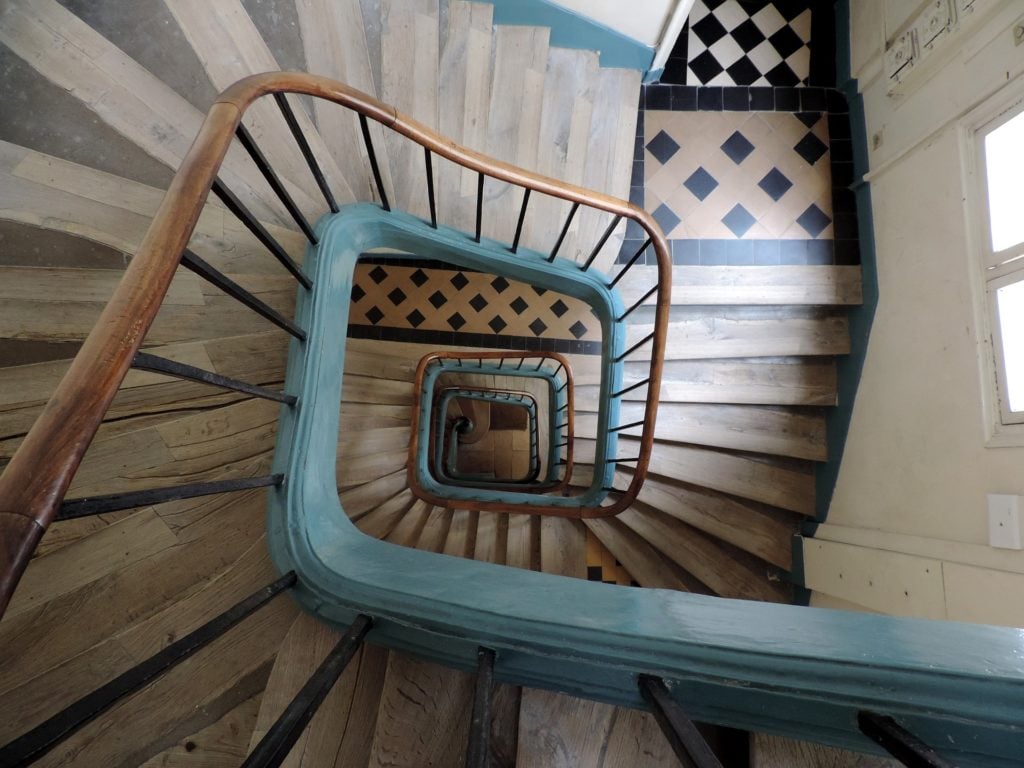 Looking down a spiral staircase