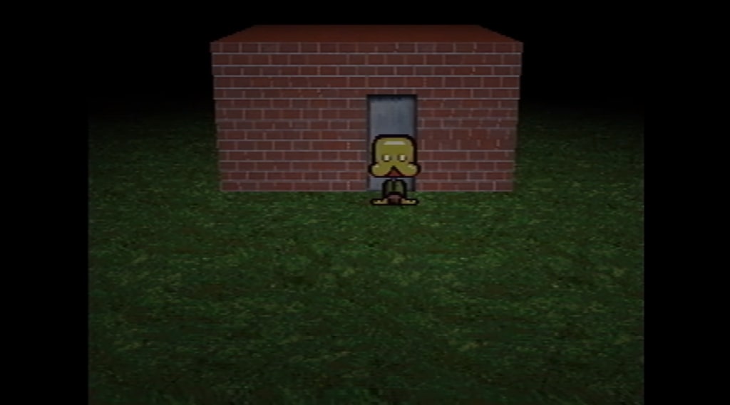 A screenshot from Petscop of the player character standing in front of a plain brick building