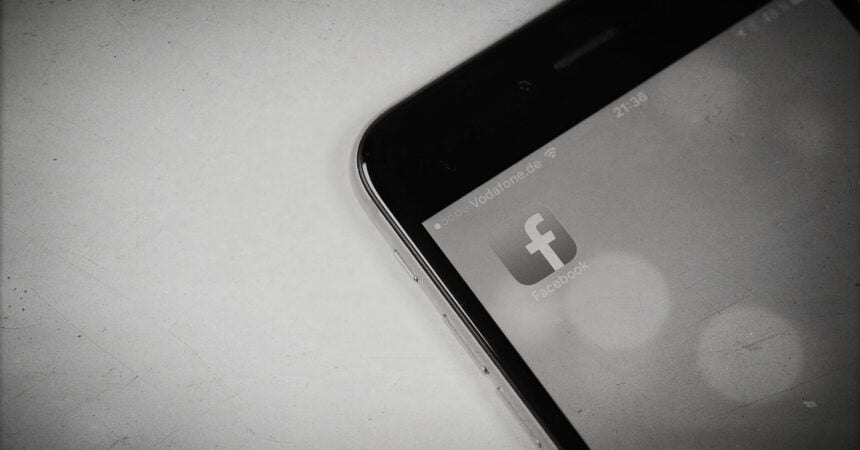 A smartphone with a facebook icon