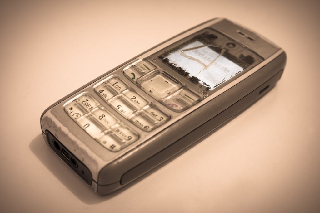 An old, broken cell phone