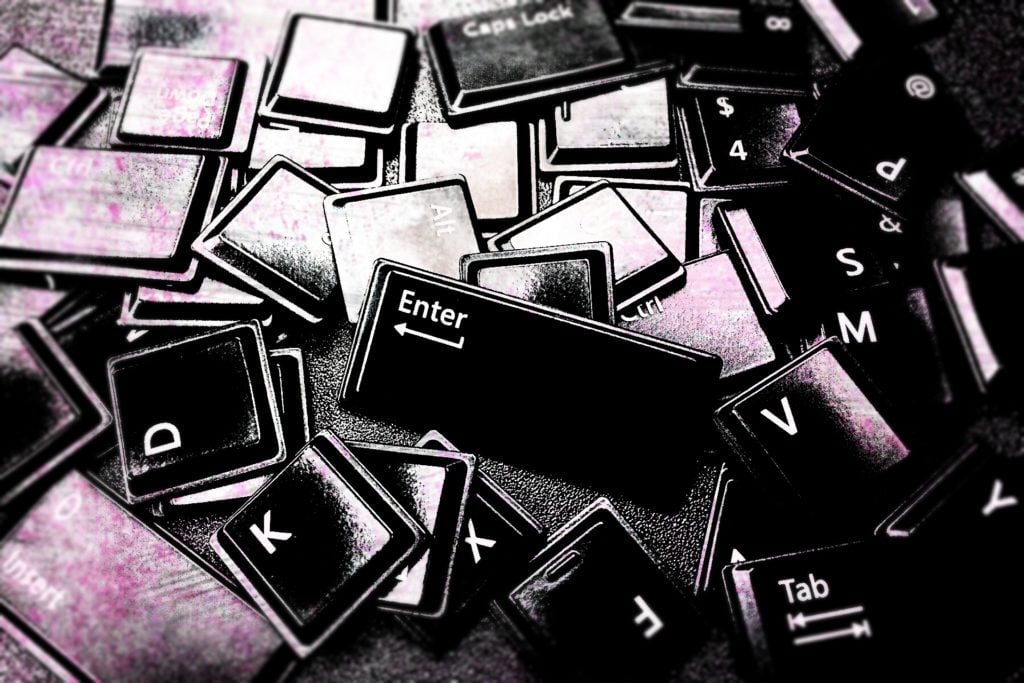 Keys from a computer keyboard, loose in a pile