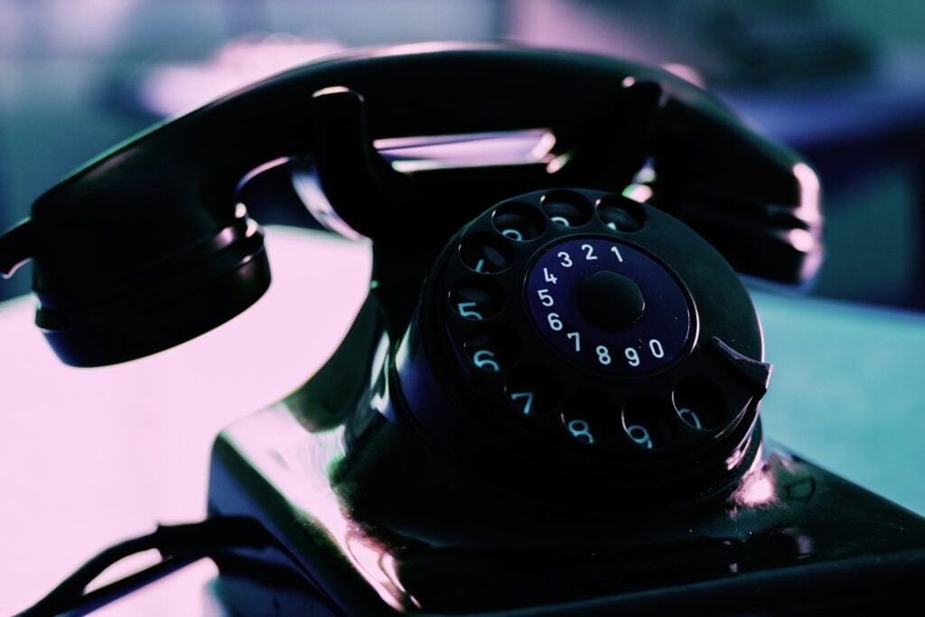 a black rotary telephone