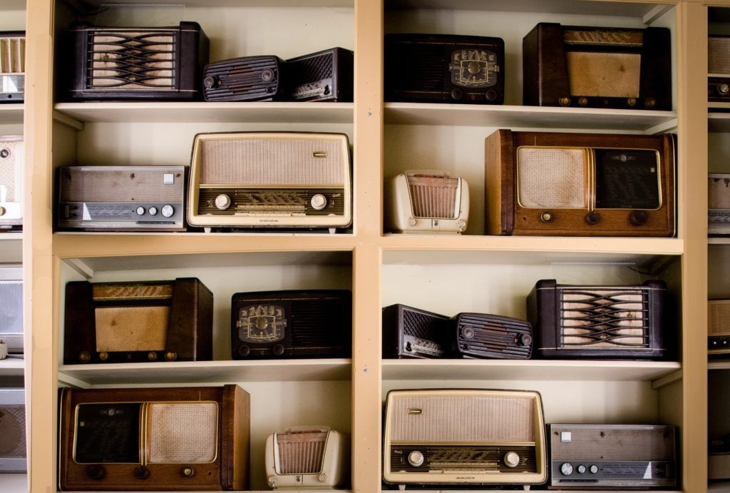 A wall of vintage radios