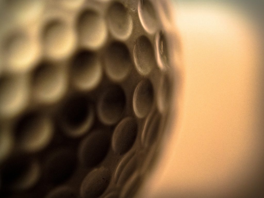 A close-up of a golf ball