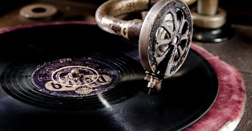 A close-up of a record on a phonograph