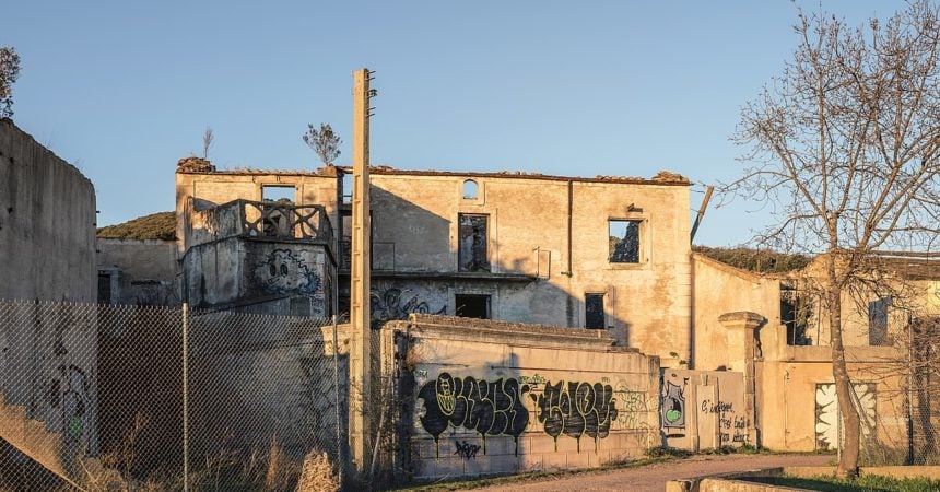 An abandoned building covered with graffiti in Celles, France.