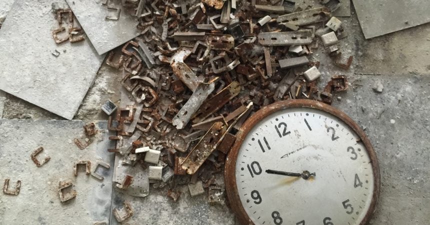A clock face lying on the ground