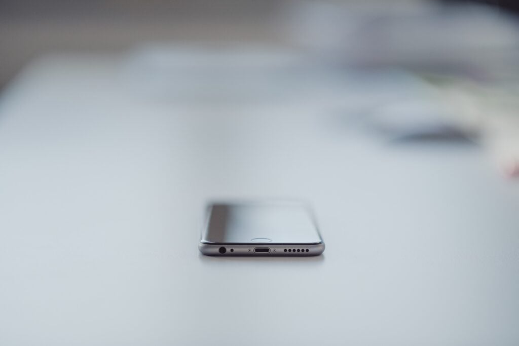 An iphone lying on a table