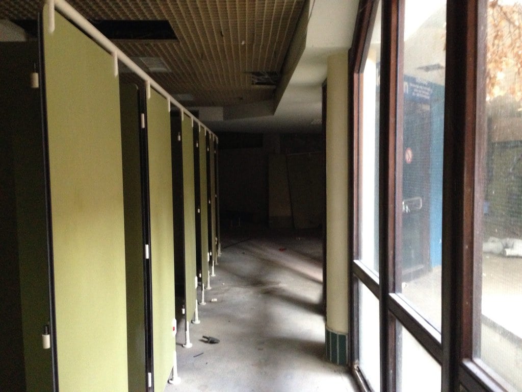 A row of changing stalls at the abandoned Blub water park in Berlin, 2013.