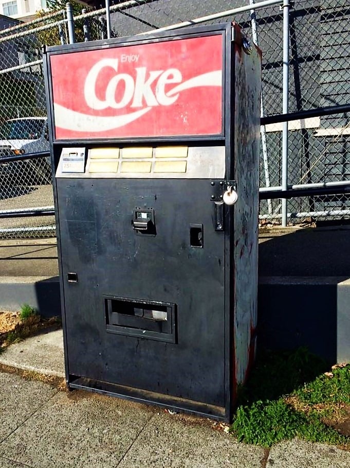 A vintage Coca-Cola machine known as the "mystery soda machine" of Seattle's Capitol Hill neighborhood.