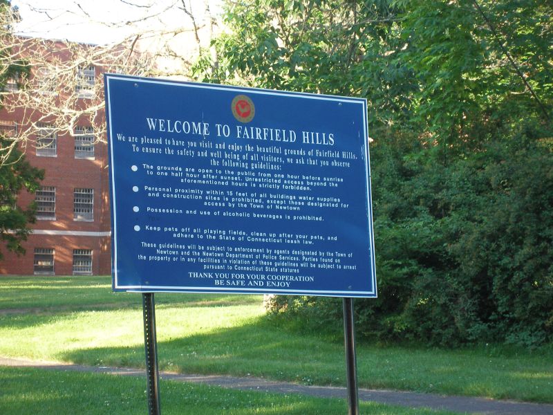 Blue "Welcome to Fairfield Hills" sign
