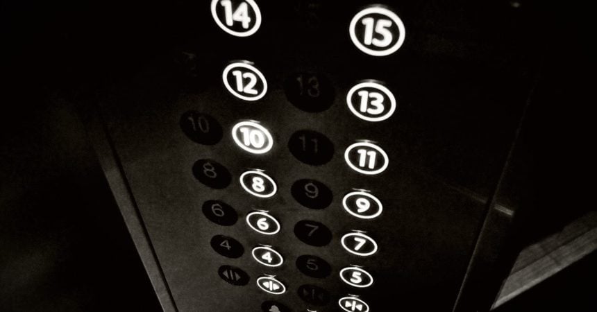 The control panel of an elevator, with buttons going up to 15
