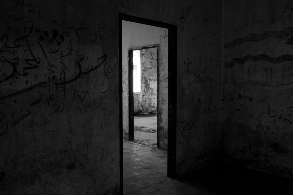 Looking through doorways in an abandoned home