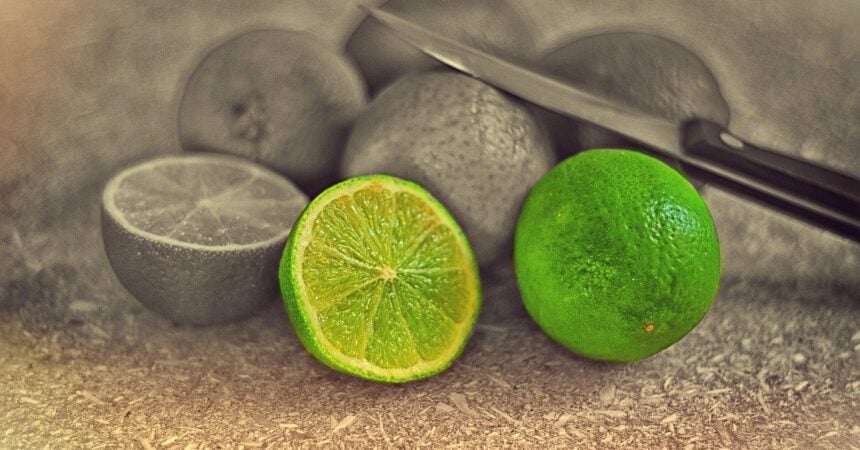 Limes on a table with a knife