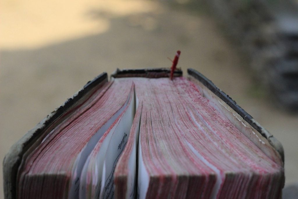 Red-edged pages of an old book