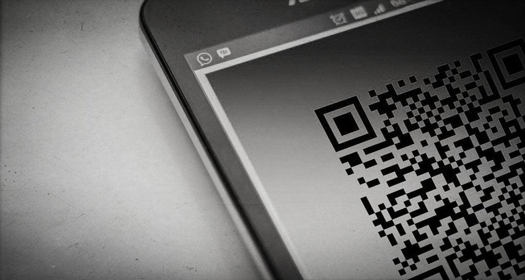 A QR code displayed on a smartphone screen