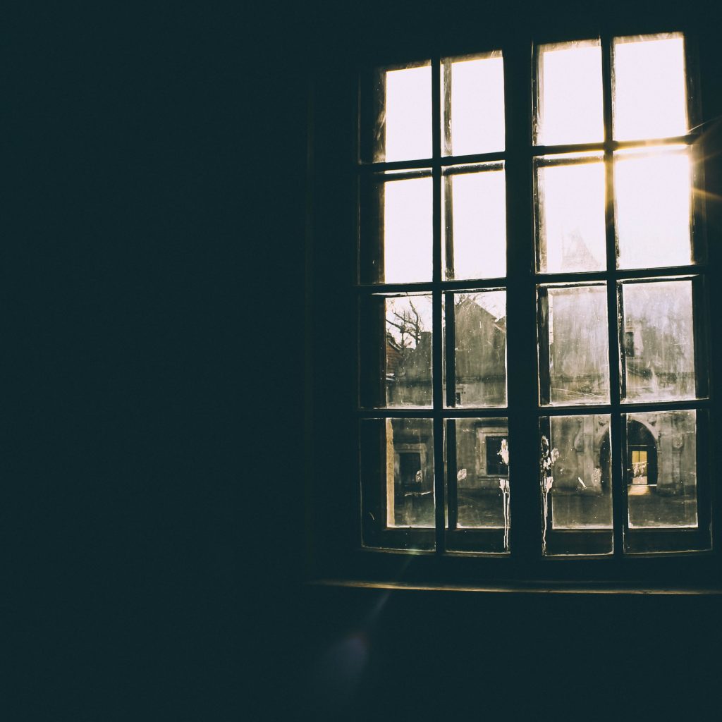 A window in a dark room