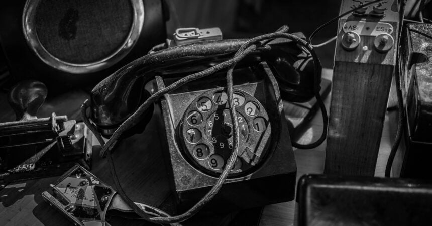An old, broken rotary telephone