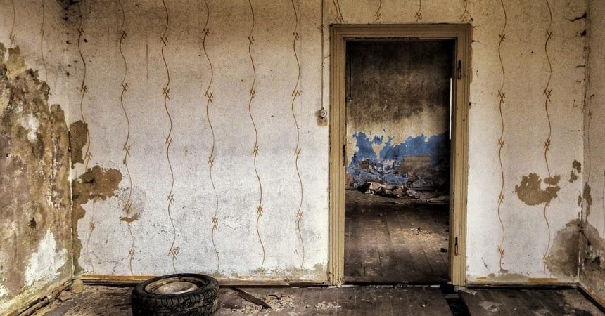 A decaying room in an abandoned house
