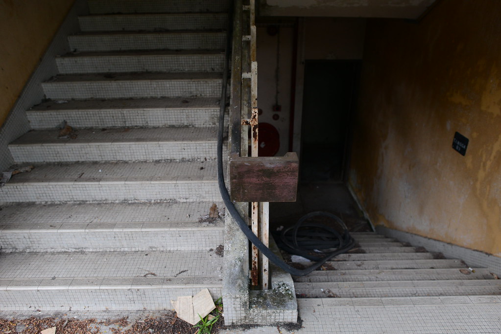 A stairwell at the abandoned hostel