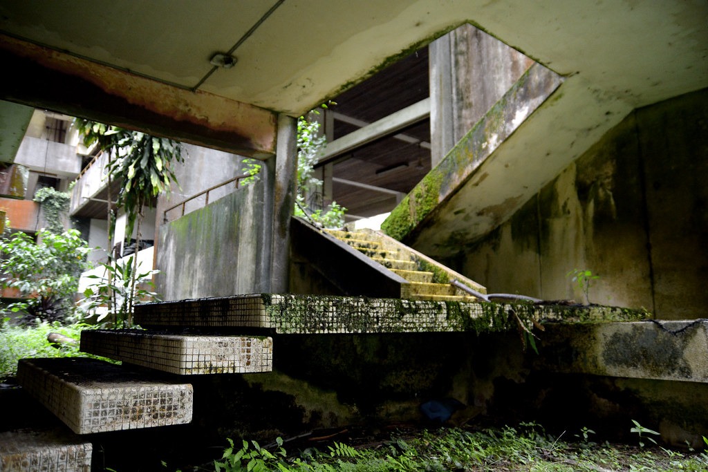 Stairs at an entrance to the abandoned hostel