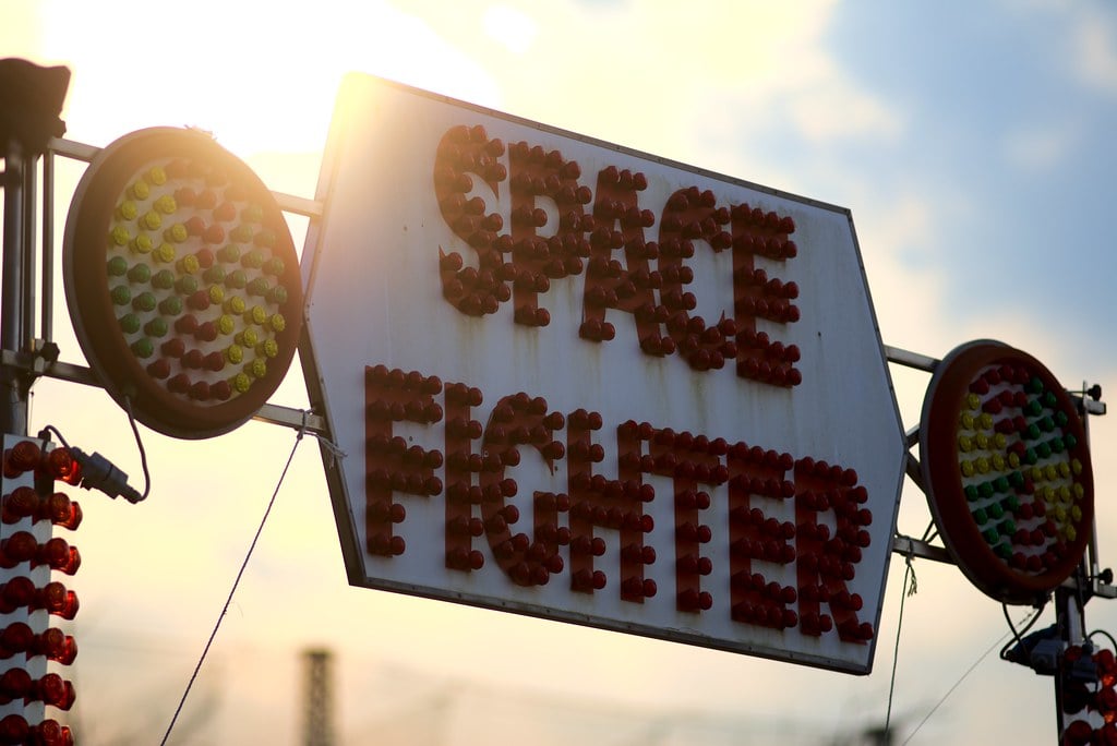 The sign for the SPACE FIGHTER attraction at Yongma Land