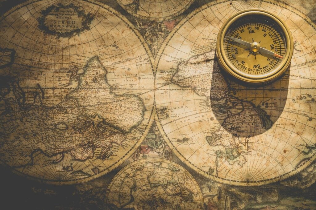 a vintage-style map with a compass sitting on the right hand side