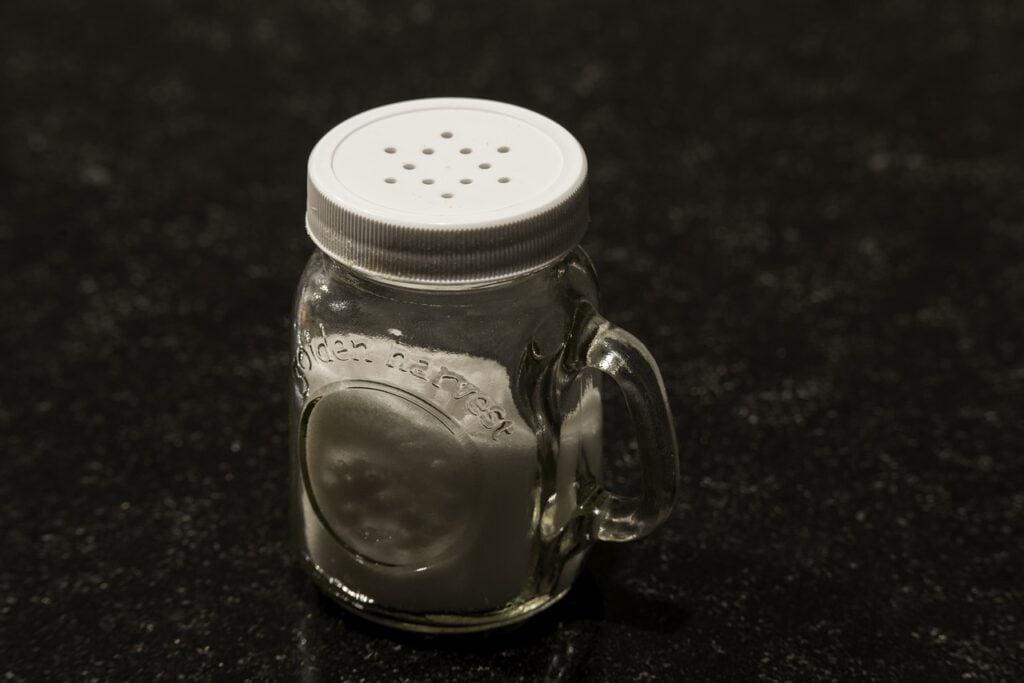 a salt shaker with salt inside