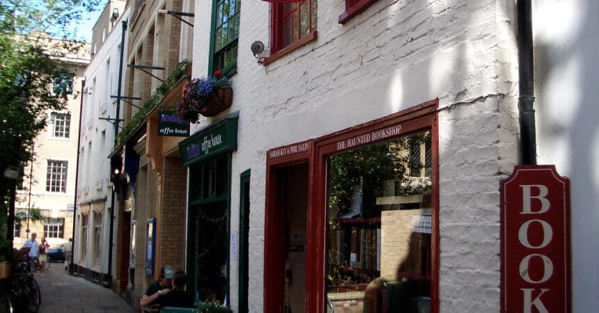 the Haunted Bookshop, a white storefront with red accents
