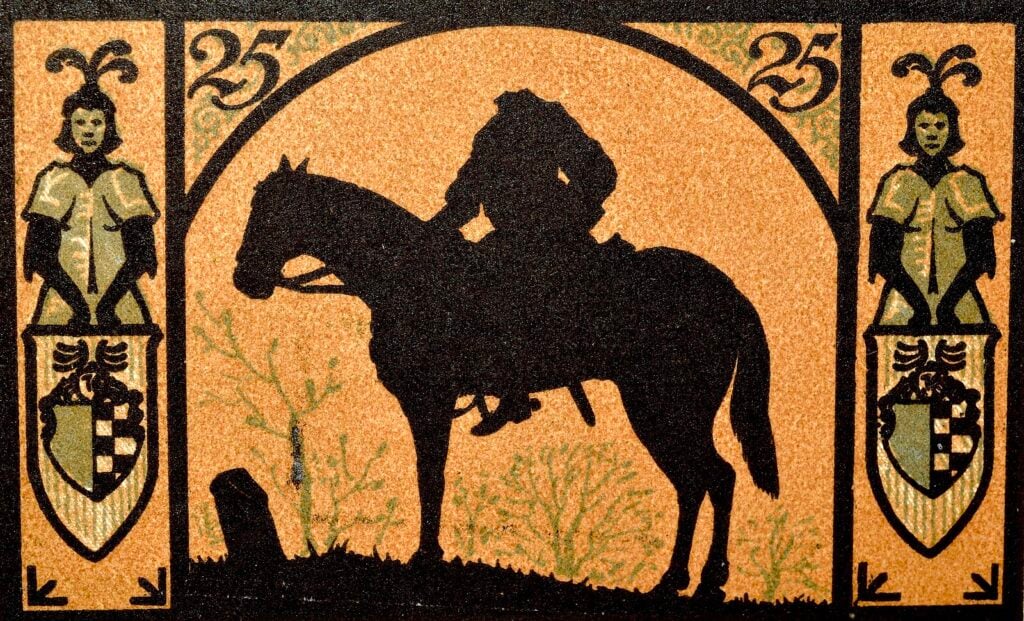 art depicting a silhouette of a headless horseman against an orange background