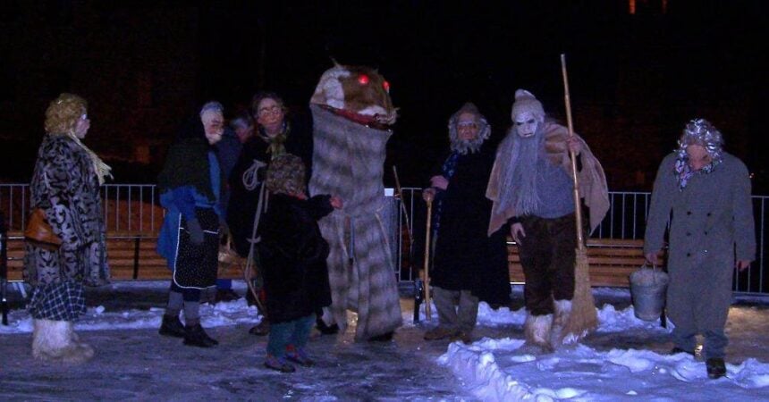 a person costumed as the goat-serpent creature badalisc, captured on epiphany by the townspeople of Andrista, Italy