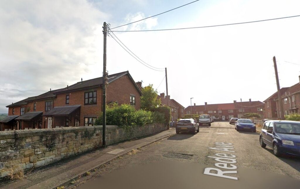 Rede Avenue, a residential street lined with brick council houses, in Hexham in the UK