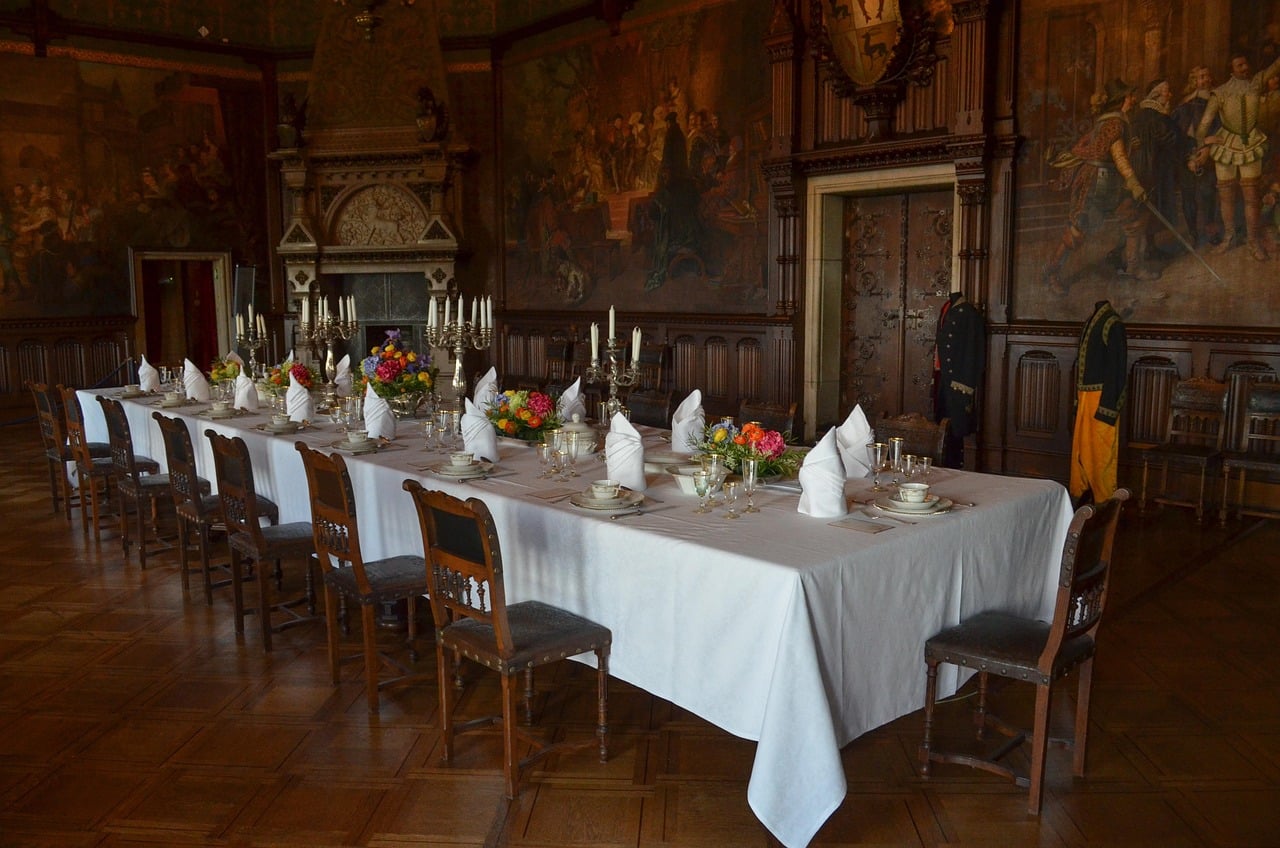 Dinner Party Horror For All Your Halloween Party Needs: What To Read, Watch, And Play For Maximum Mayhem