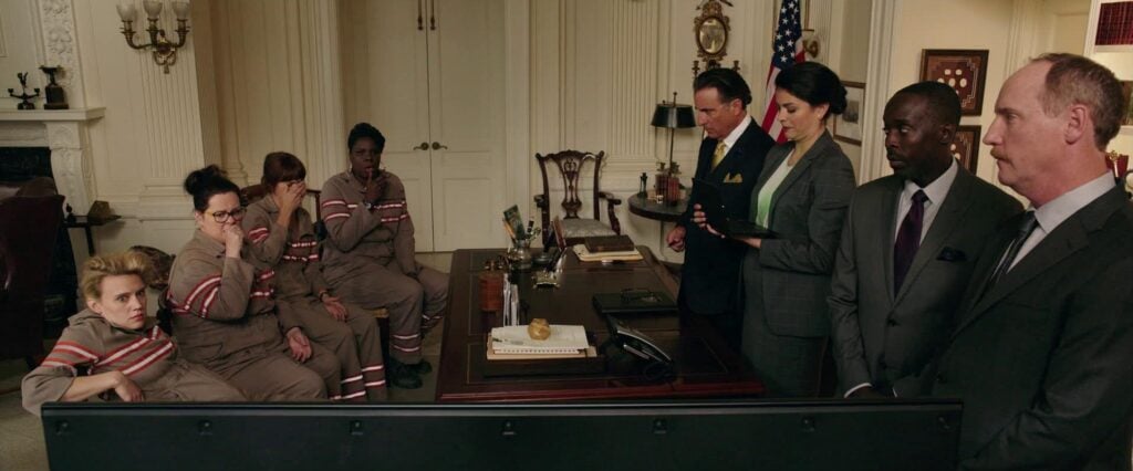 the Ghostbusters in the mayor's office in Ghostbusters (2016)